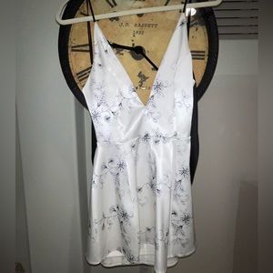 Black and white floral stitch mini formal dress with black ties
